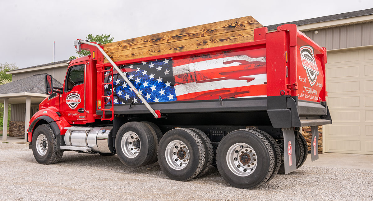 Mann Hauling, Excavation & Land Clearing logo